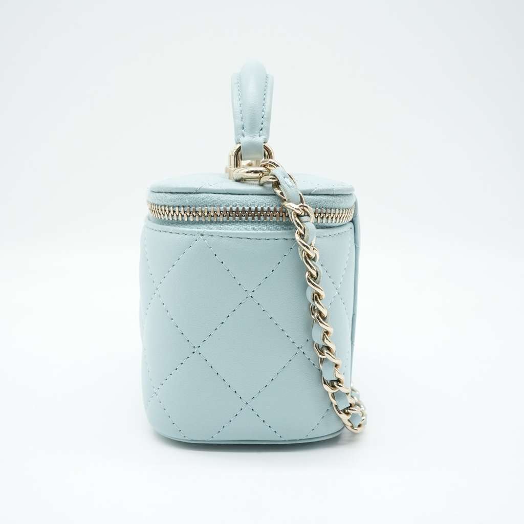 Chanel Mini Top Handle Vanity Case With Chain Light Blue Quilted Lambskin - Side view